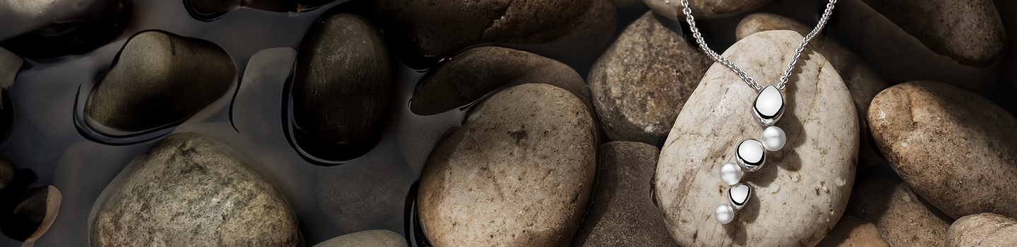 Birks pebble on a brown rock background