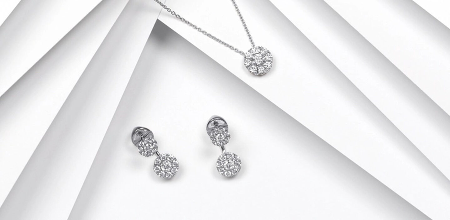 Round Birks Snowflake white gold and diamond pendant necklace with matching jacket earrings