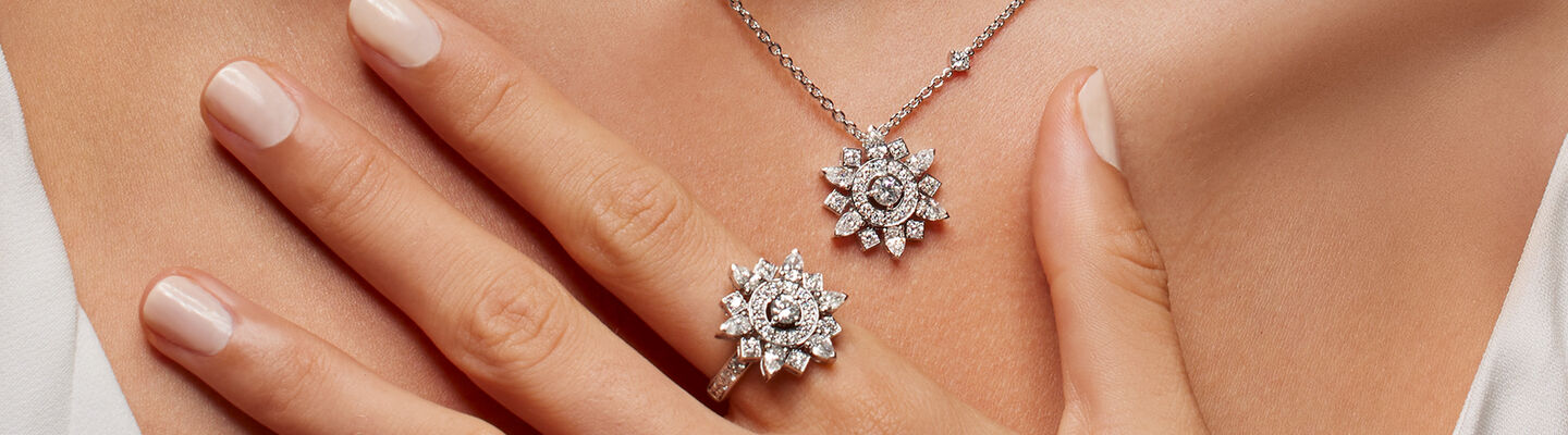 A woman wearing the Birks Snowflake High Jewellery collection.