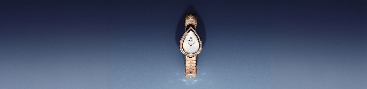 A Chaumet Jos&eacute;phine watch on a dark blue background.