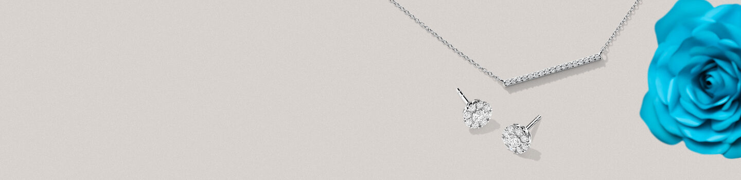 Birks Rosée du Matin diamond bar necklace and Birks Snowflake diamond stud earrings
