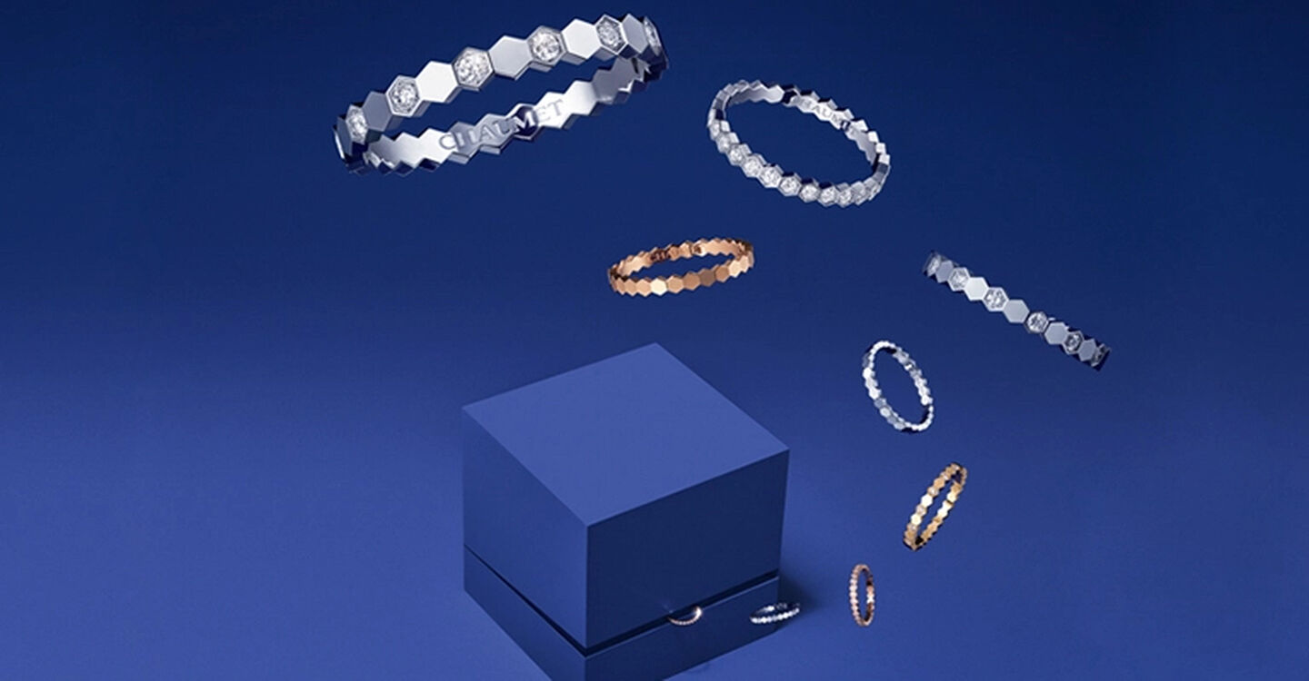 Chaumet's Bee My Love collection floating over blue box 