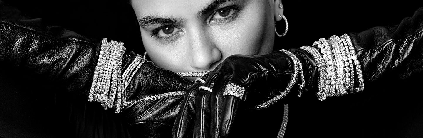 Woman with black gloves wearing ALTR diamonds