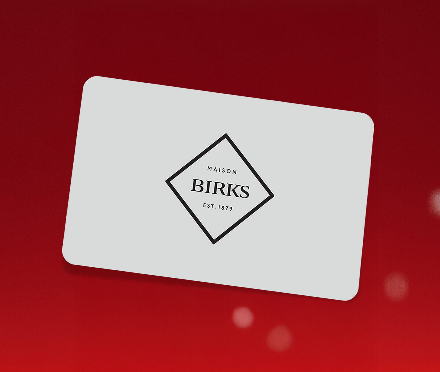 Gift card with a jewelry birks logo on a red background.