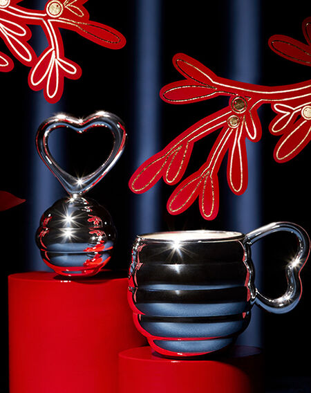 Silver cup and decorative heart
