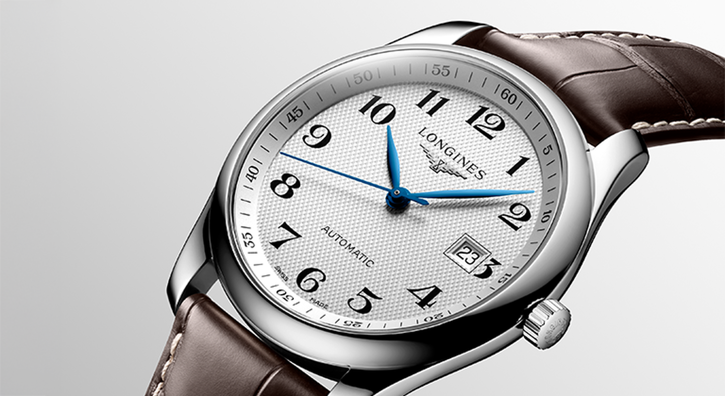 Longines master watch on a greige 