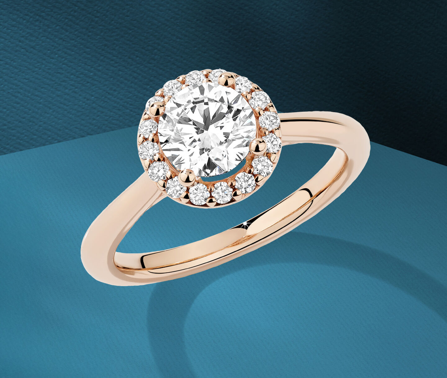 Birks 1879 halo diamond engagement ring in rose gold.