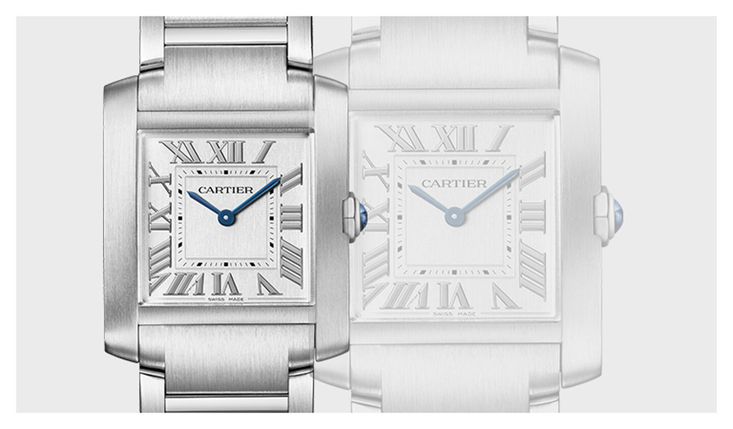 Tank de Cartier watch on a grey background. 