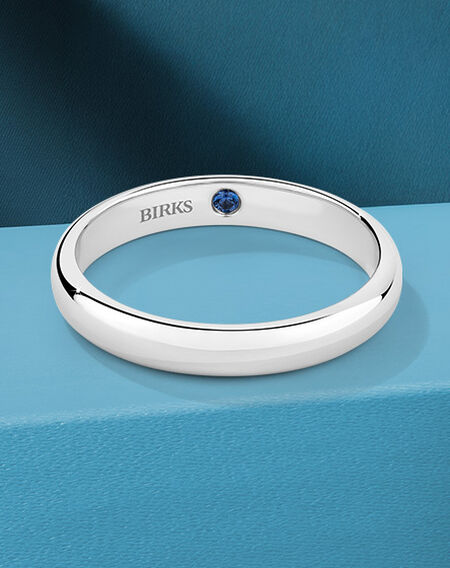 Birks Blue wedding band on a blue background.