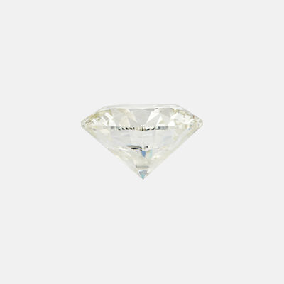 Diamant brut Birks sur un fond gris clair.