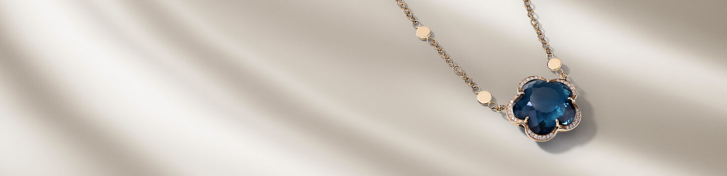 Pasquale Bruni Bon Ton necklace on a beige background.
