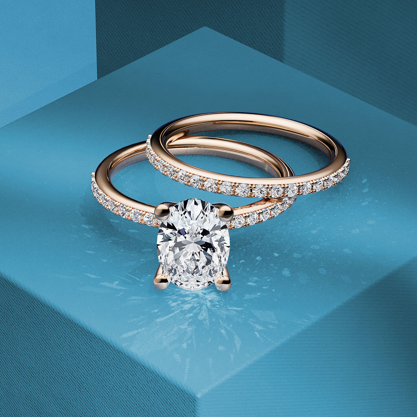 Three Birks diamond engagement rings on a blue background.