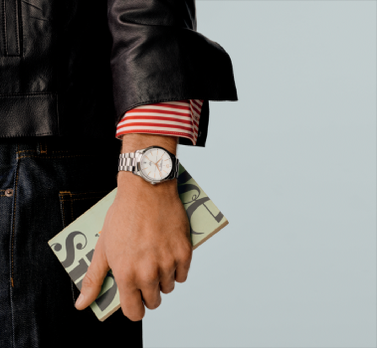 A man wearing a Baume & Mercier watch.