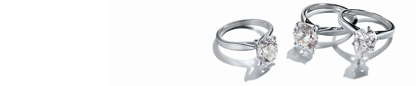 Three ALTR diamond engagement rings
