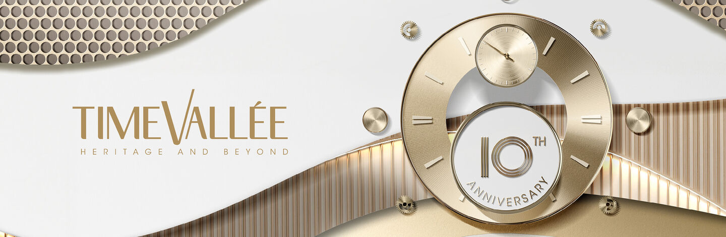 TimeVall&eacute;e 10th anniversary banner with gold clock design.