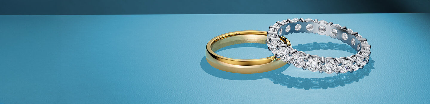 Birks Blue wedding band and diamond engagement ring with sapphire accent stone