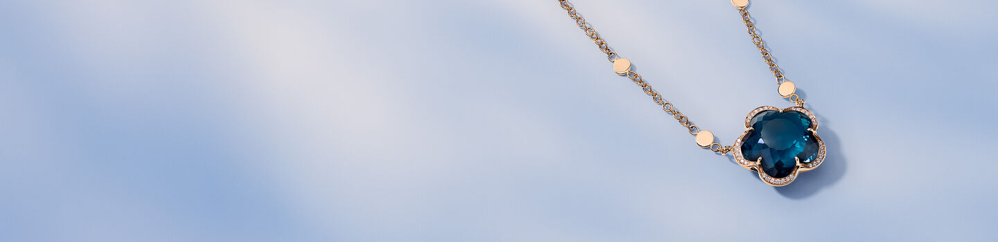 Pasquale Bruni Bon Ton necklace on a blue background.
