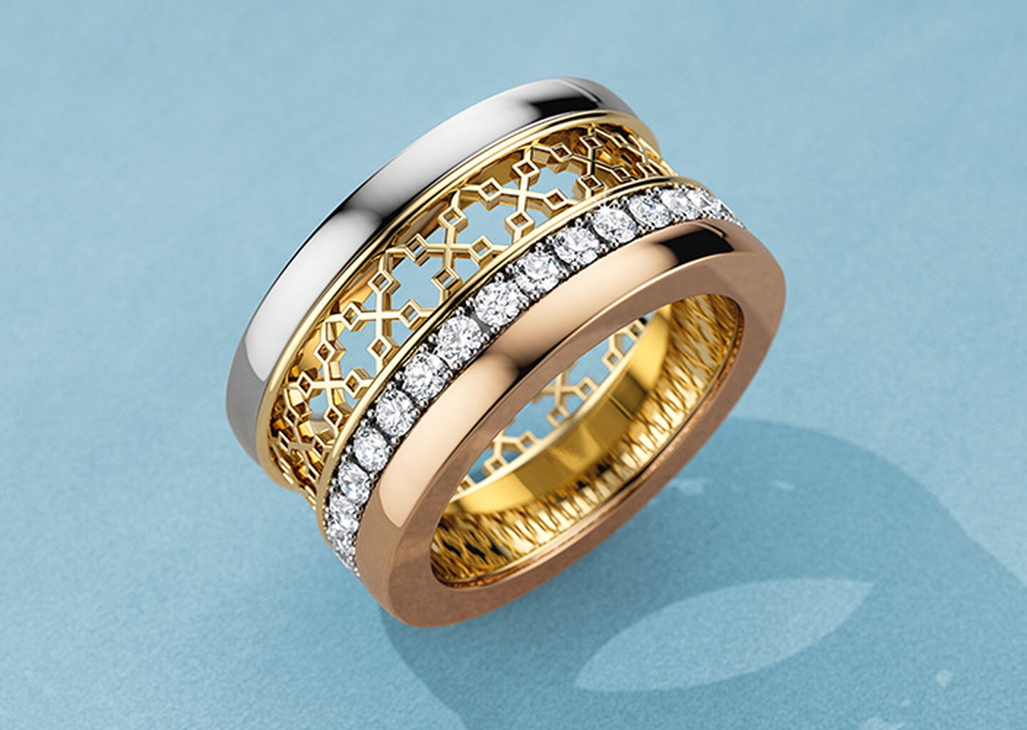 Birks Dare to Dream diamond ring on a blue background.