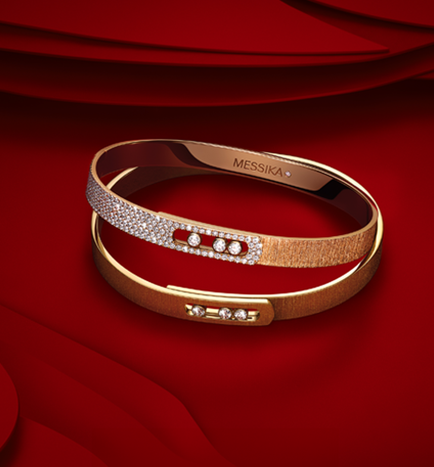 Messika Move Noa Cisel&eacute; diamond bracelets on a red background.