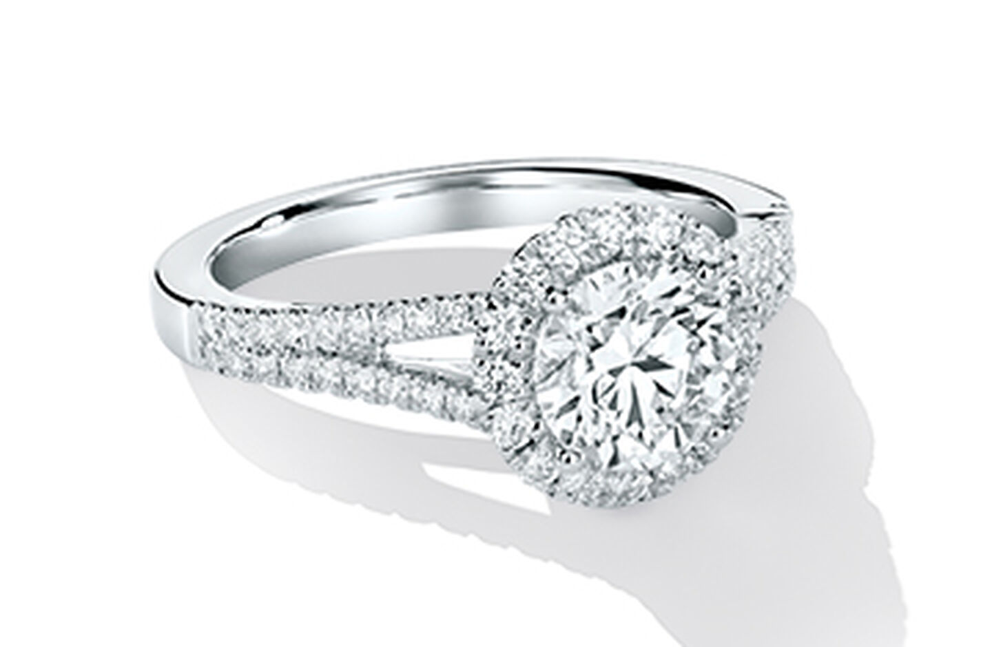 Halo white gold and diamond engagement ring
