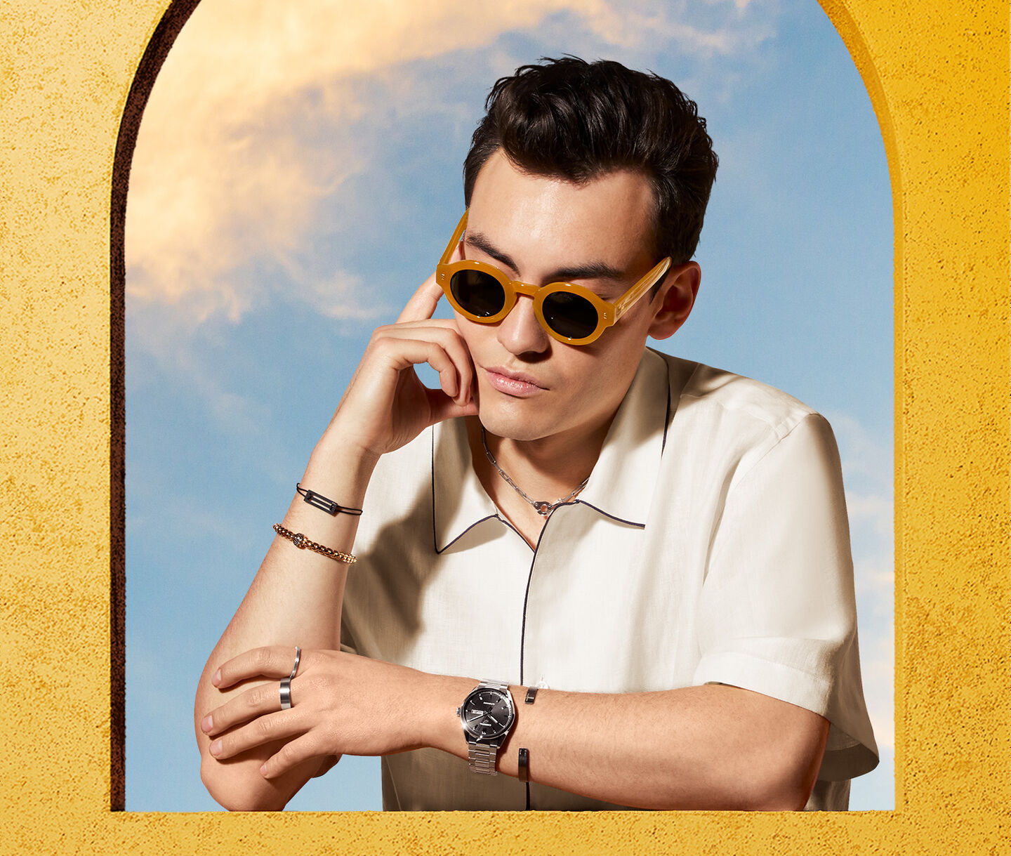 A man wearing jewellery from Maison Birks.