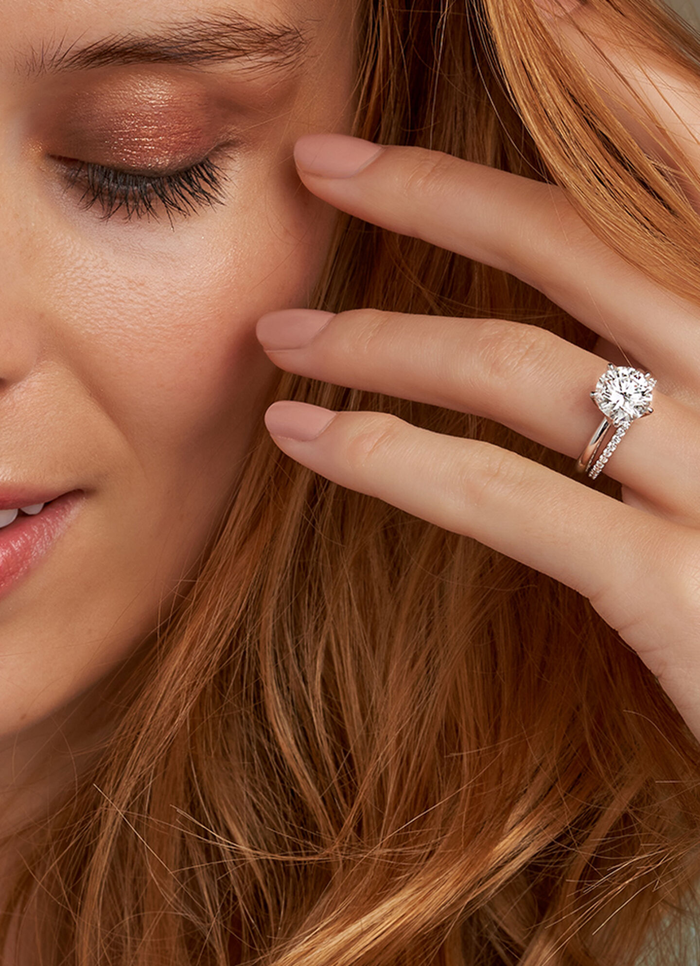 A model wearing a Birks diamond engagement ring.