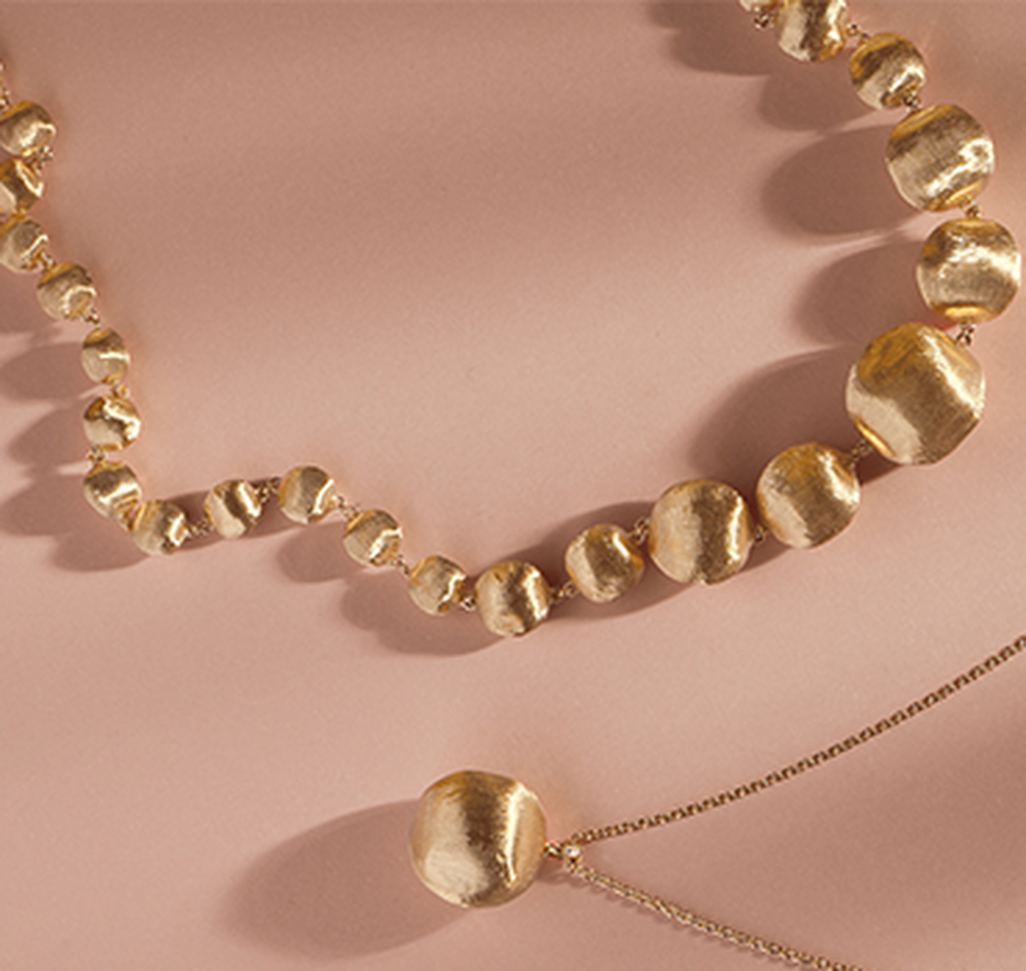 Four gold Marco Bicego necklaces