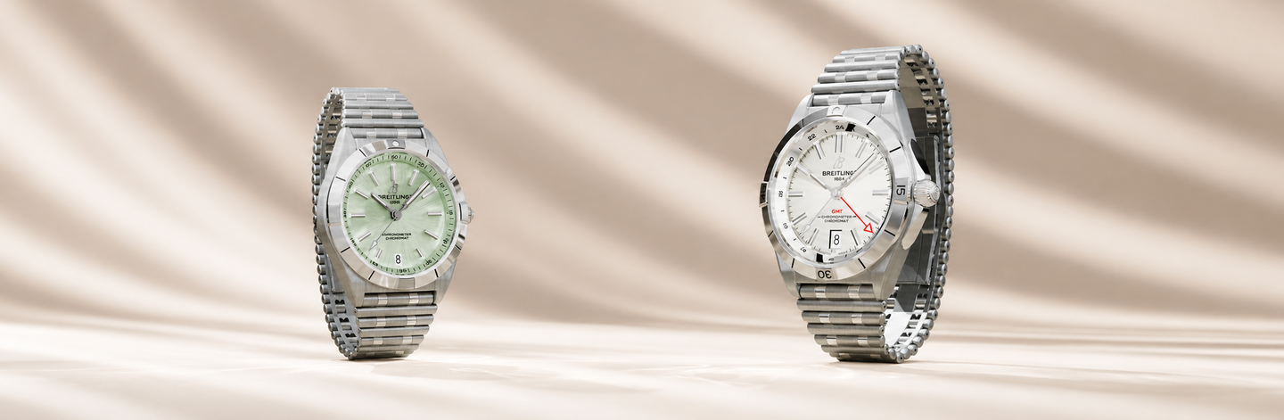 Breitling Chronomat watches on a silk beige background.