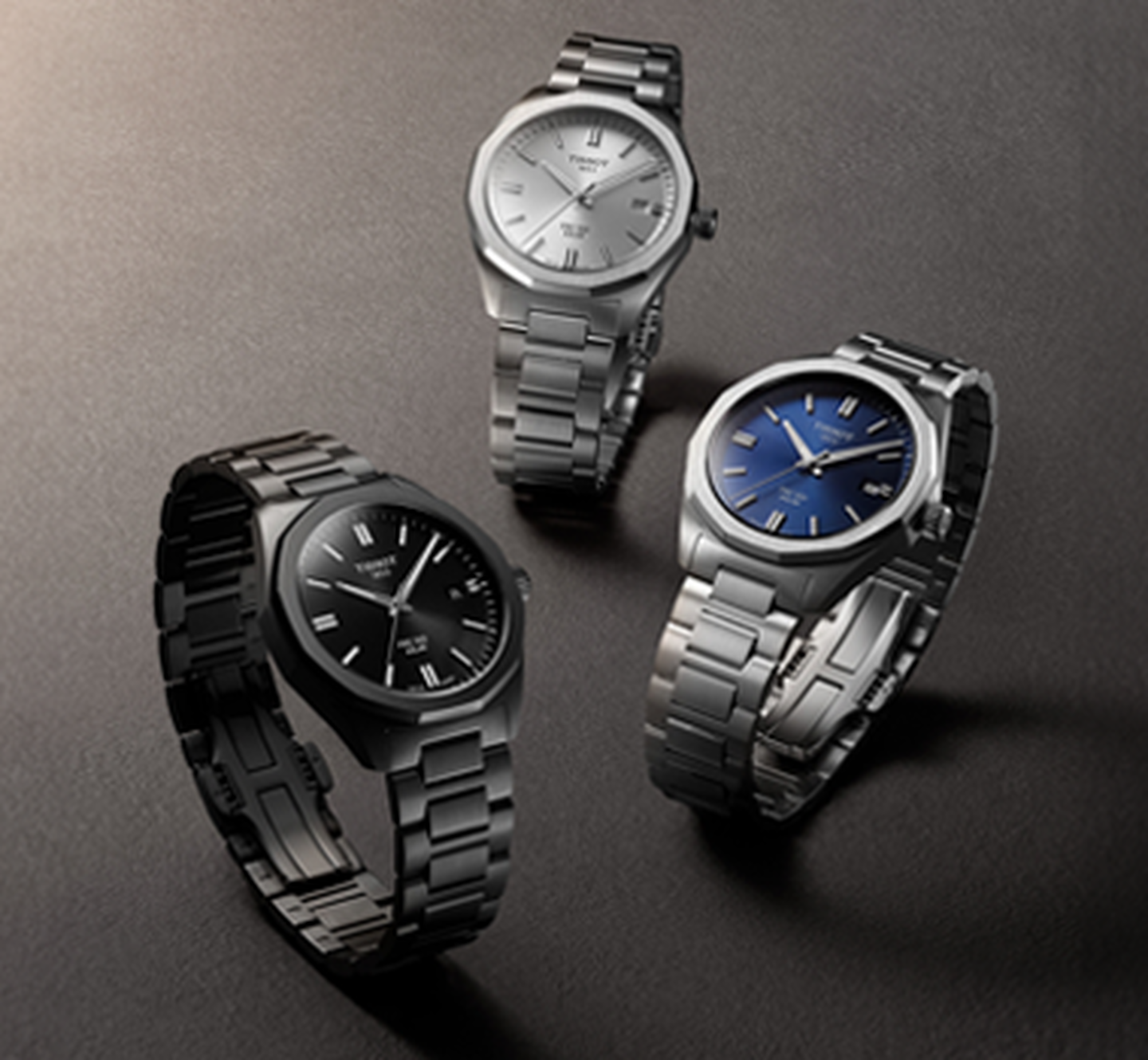 Three Tissot watches.