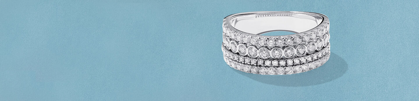 Birks Splash diamond ring on a blue background