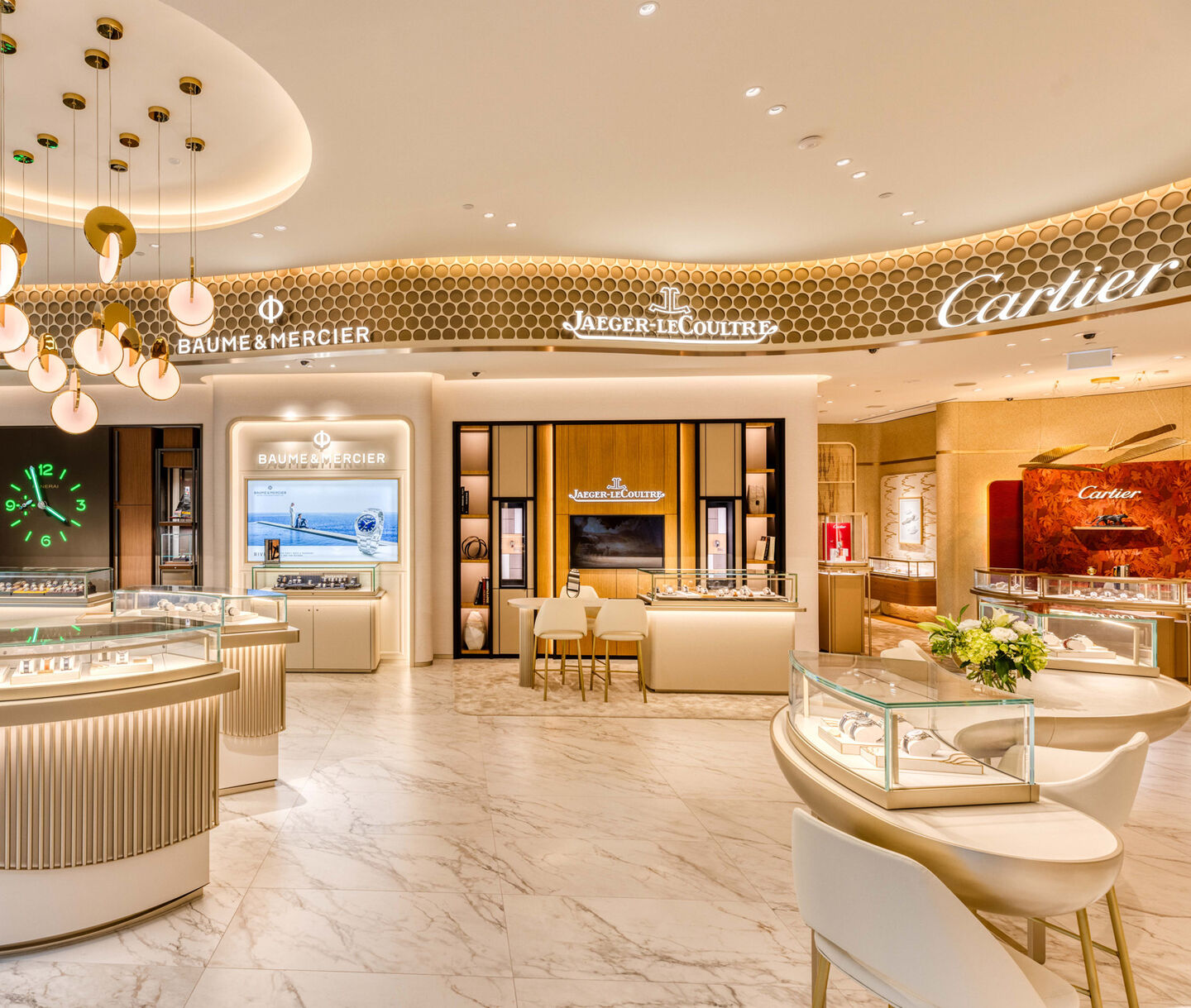 Luxury watch boutique with Cartier, Jaeger-LeCoultre, and Baume & Mercier displays.