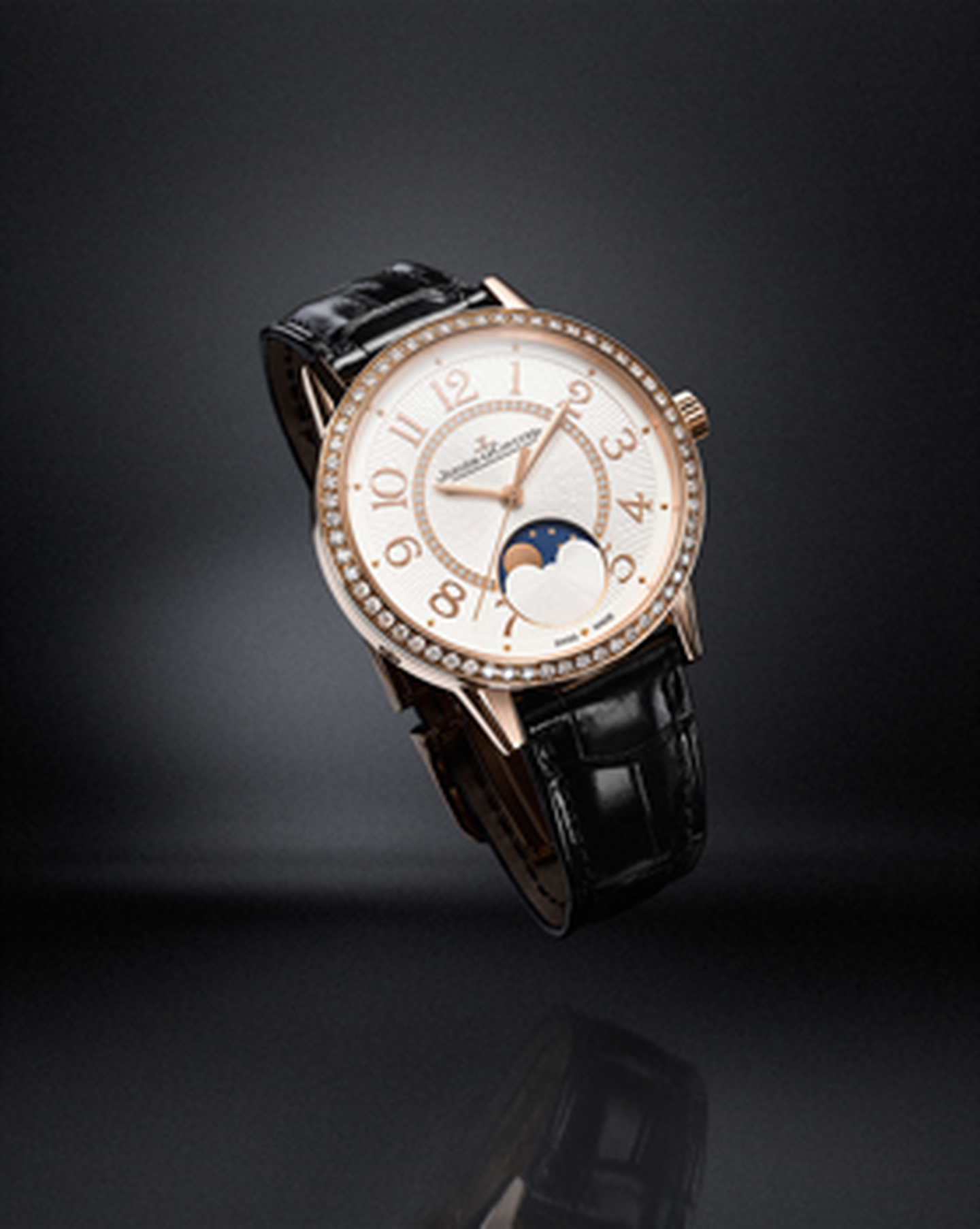 Jaeger-LeCoultre Rendez-Vous watch on a dark background.