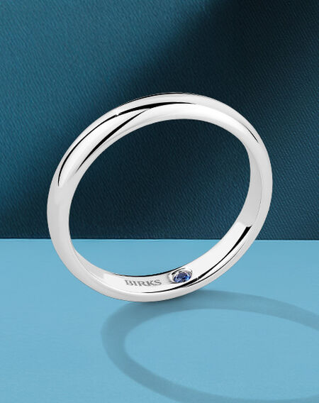 Birks Blue wedding band on a blue background.