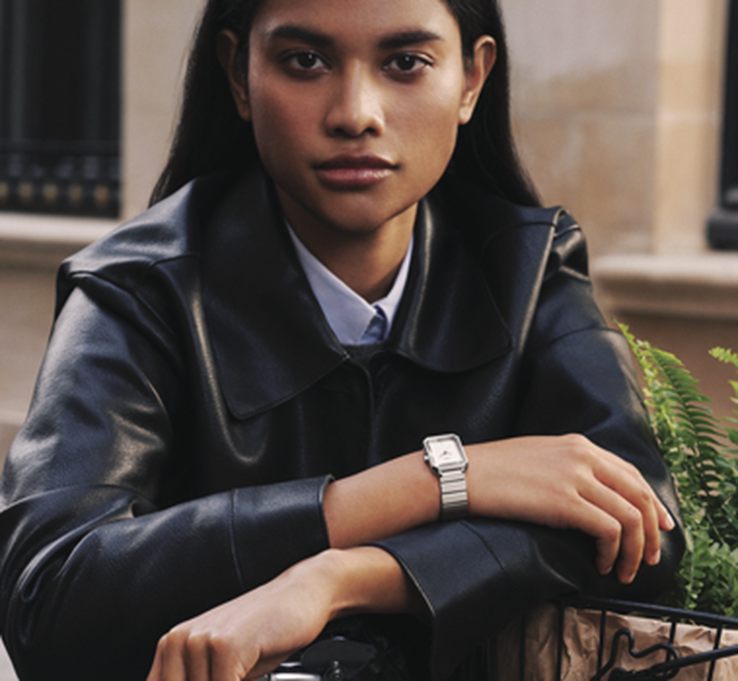 A woman wearing a Tissot watch.