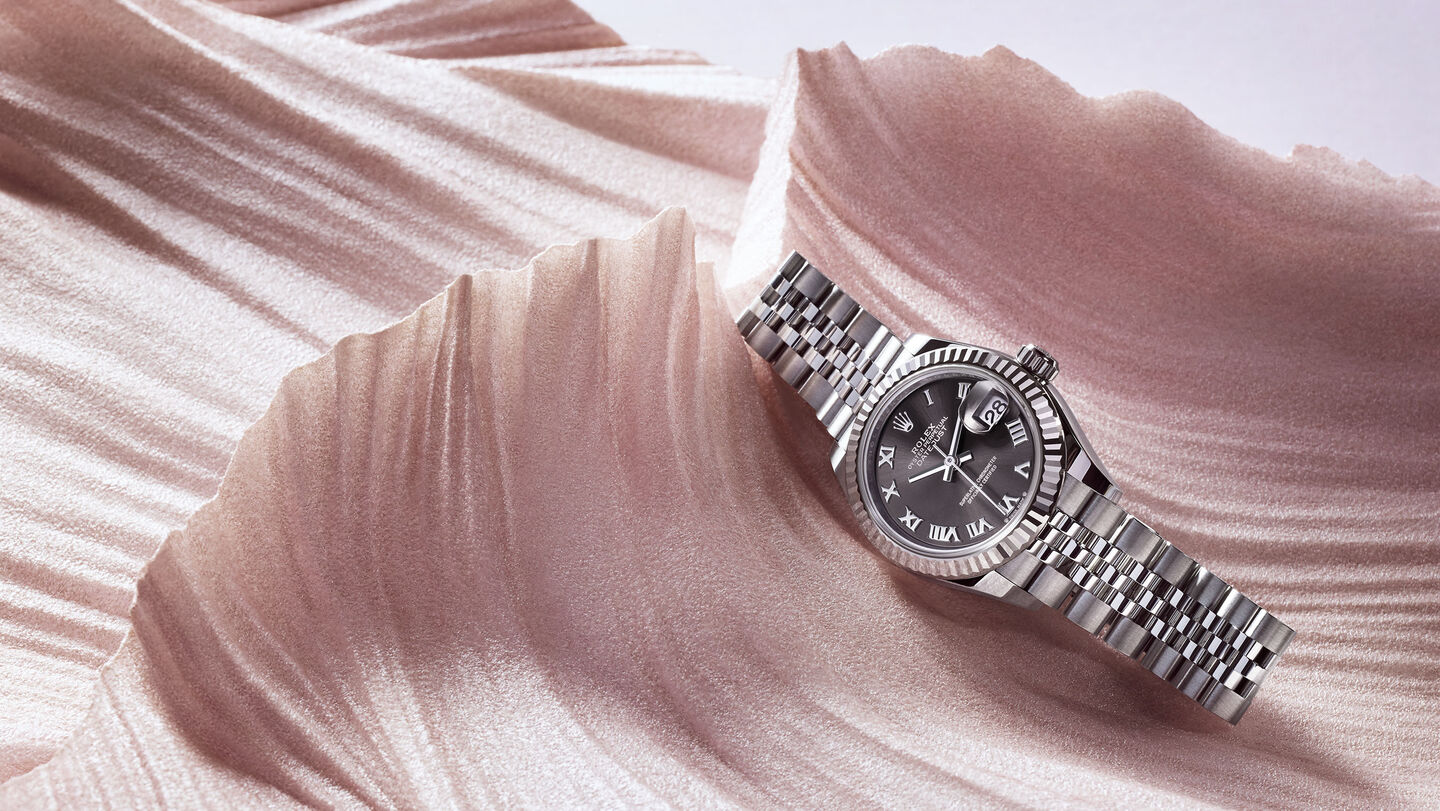 Steel watch with a black face