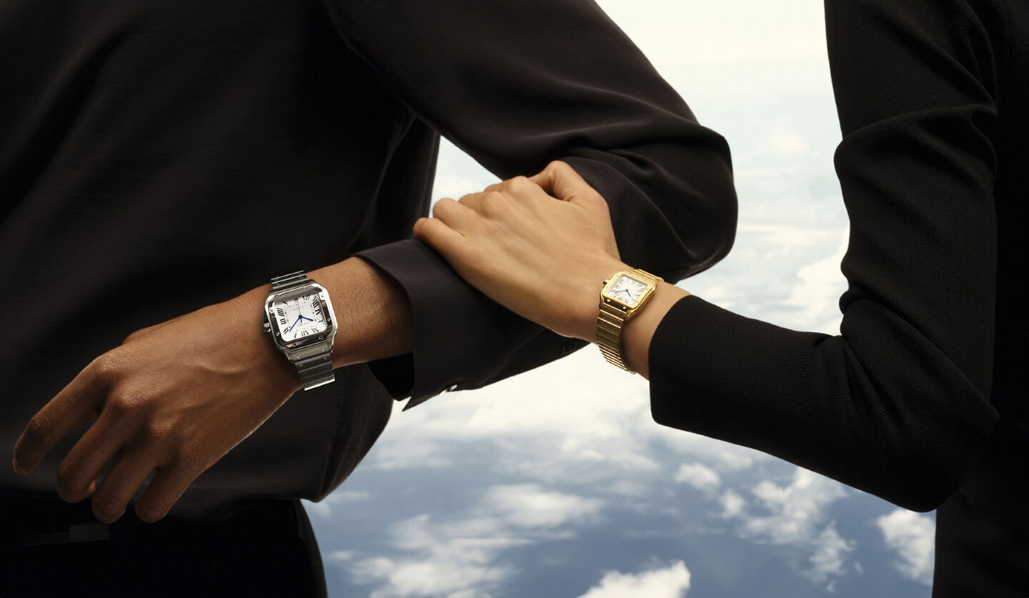 Two models wearing Cartier watches.