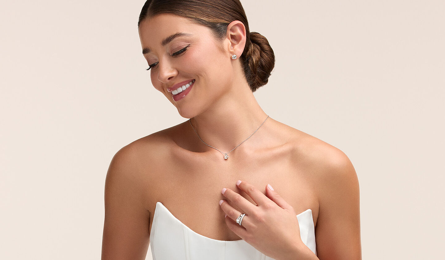 A bride wearing Birks diamond jewellery.