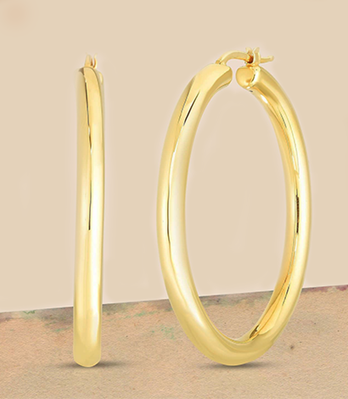Roberto Coin Basic gold hoop earrings.