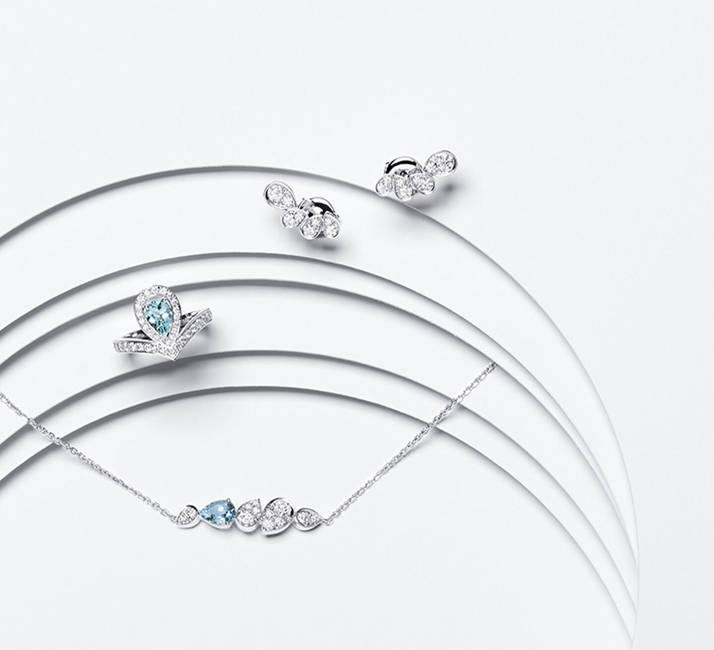 A sapphire pendant on white gold chain with a diamond accent stone