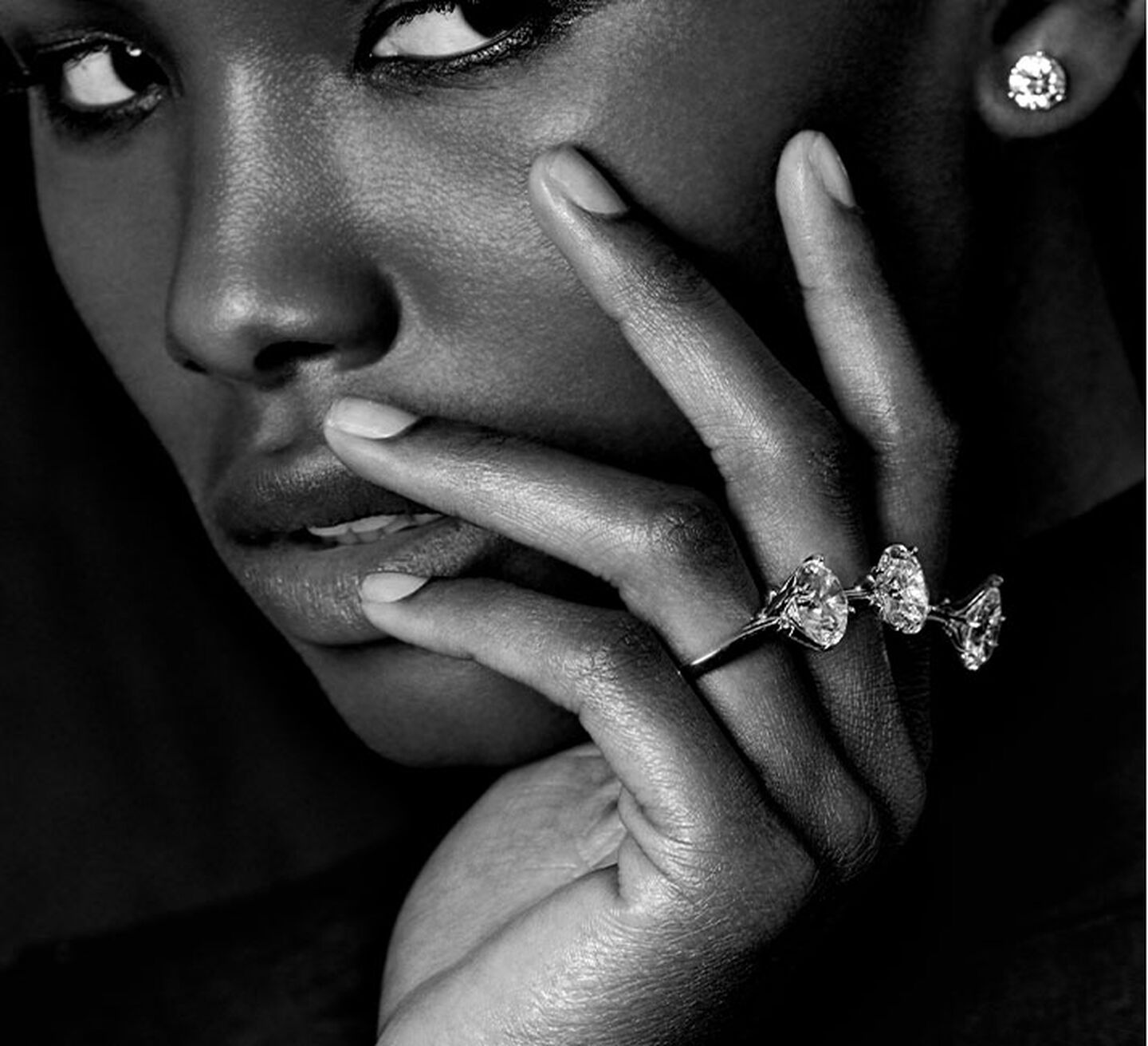Woman wearing ALTR diamond engagement rings