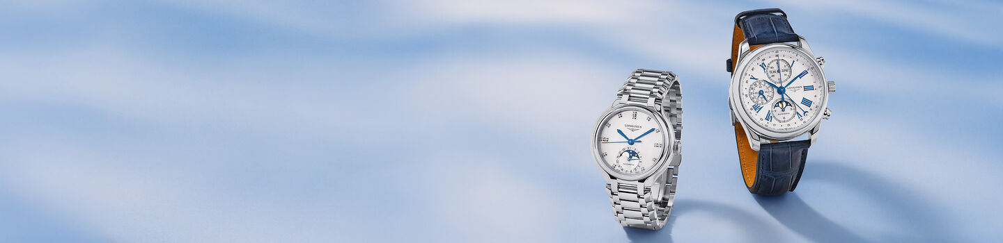 Longines watches on a blue background.