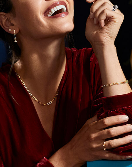 Model wearing gold jewellery