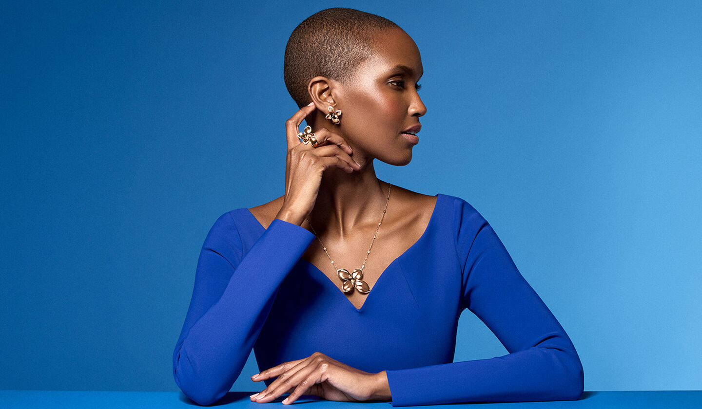 A woman wearing Pasquale Bruni's Giardini Segreti jewellery.