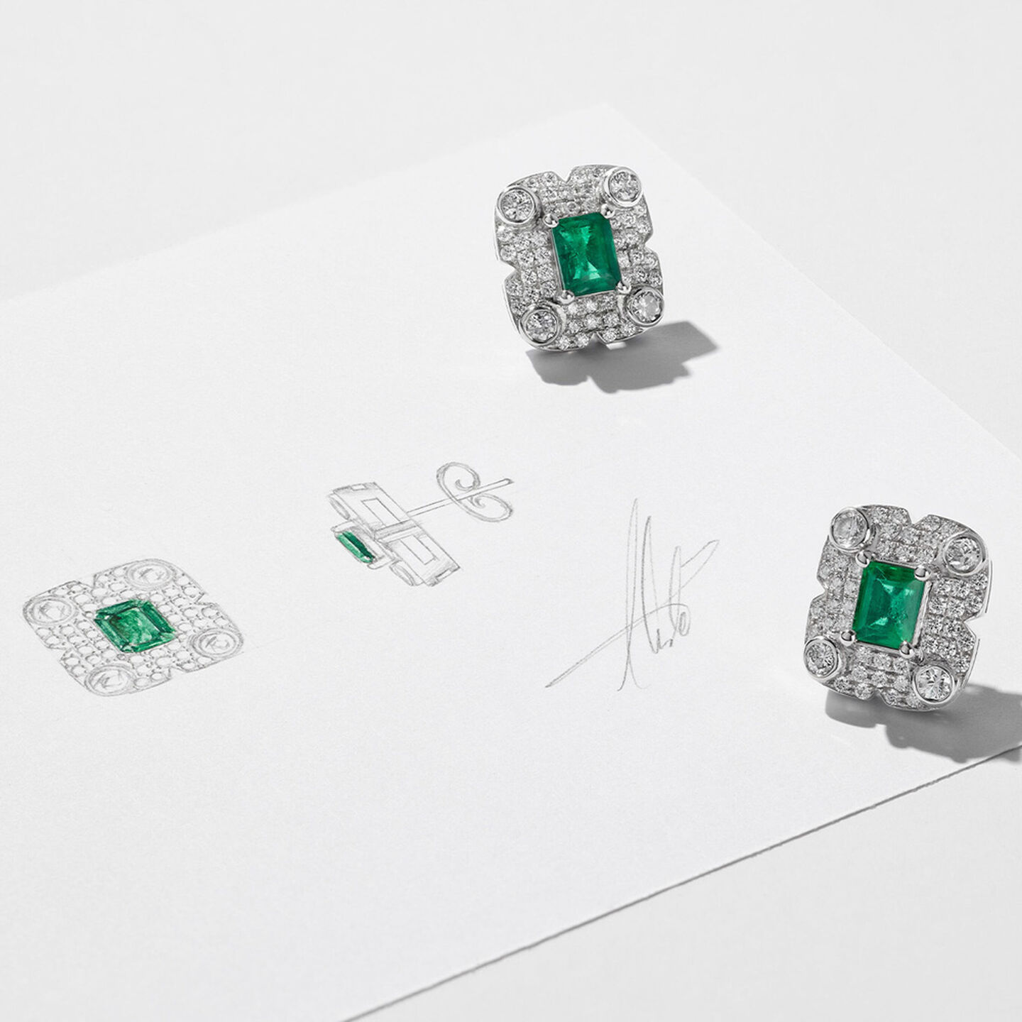 Maison Birks Bespoke emerald earrings and an illustration of the earrings.