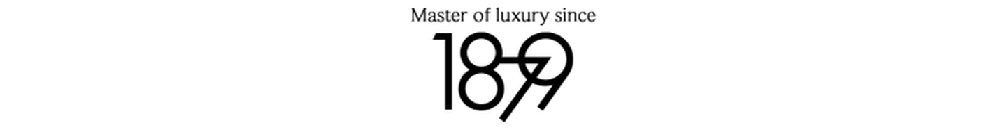"Masters of Luxury since 1879" Logo
