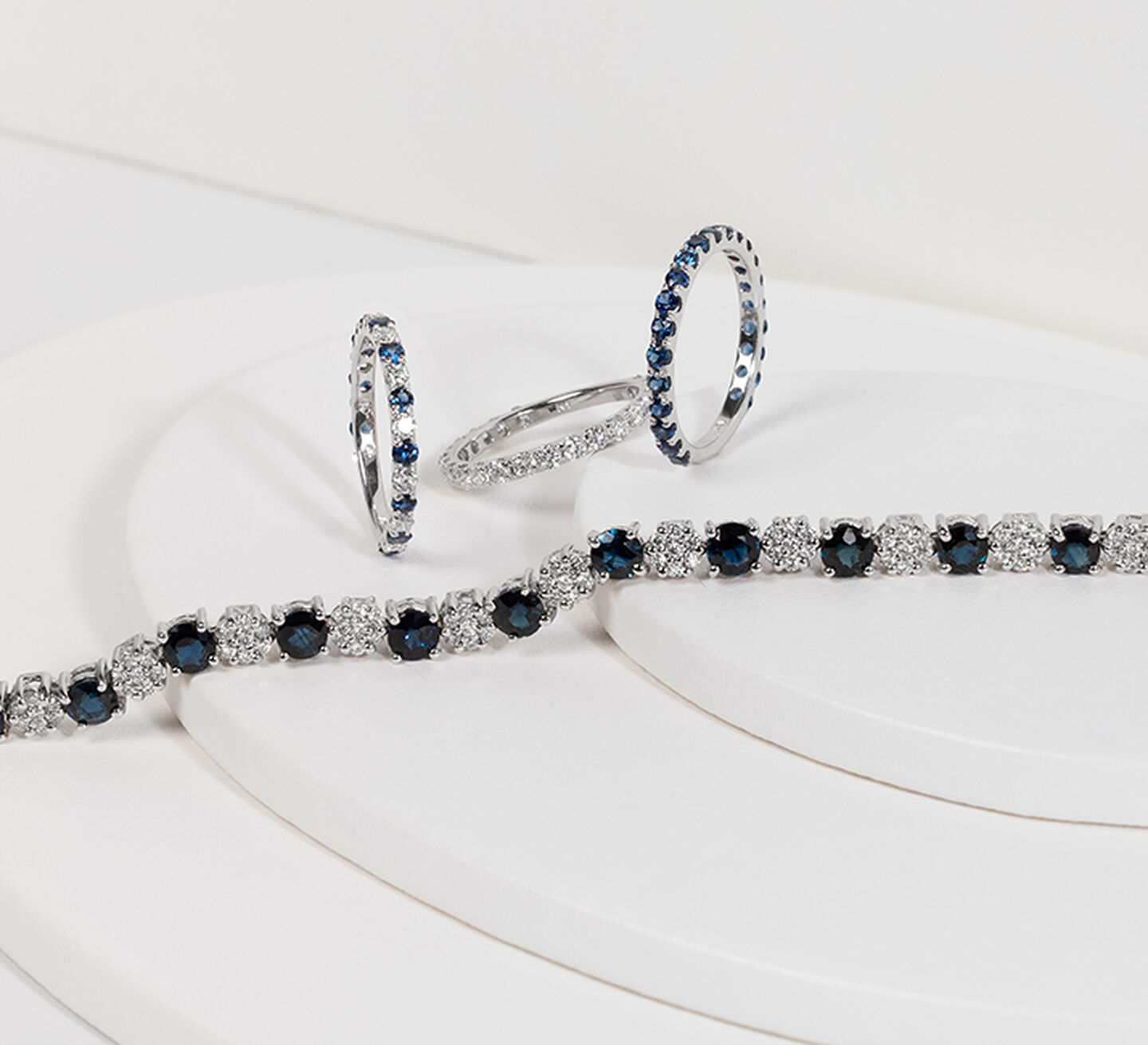 Maison Birks sapphire and diamond necklace and three rings