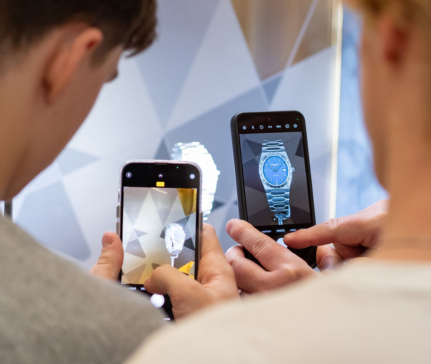 People taking photos of watches.