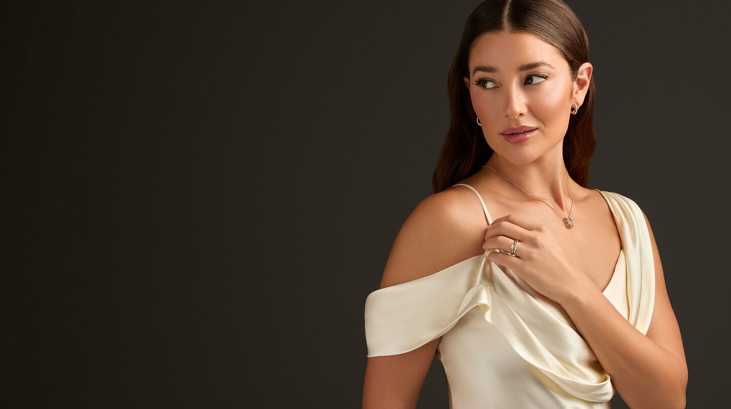 A woman wearing Birks Bridal jewellery.