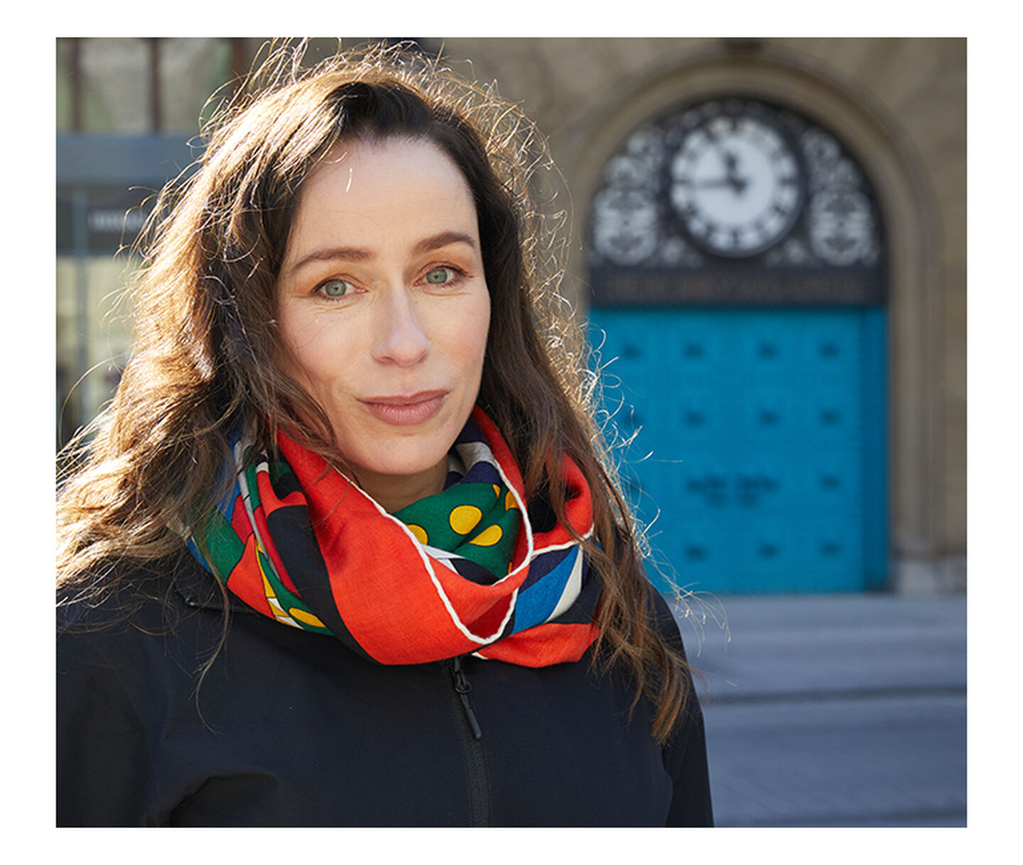Artist Stephanie Goulet poses in front of the iconic Montreal storefront
