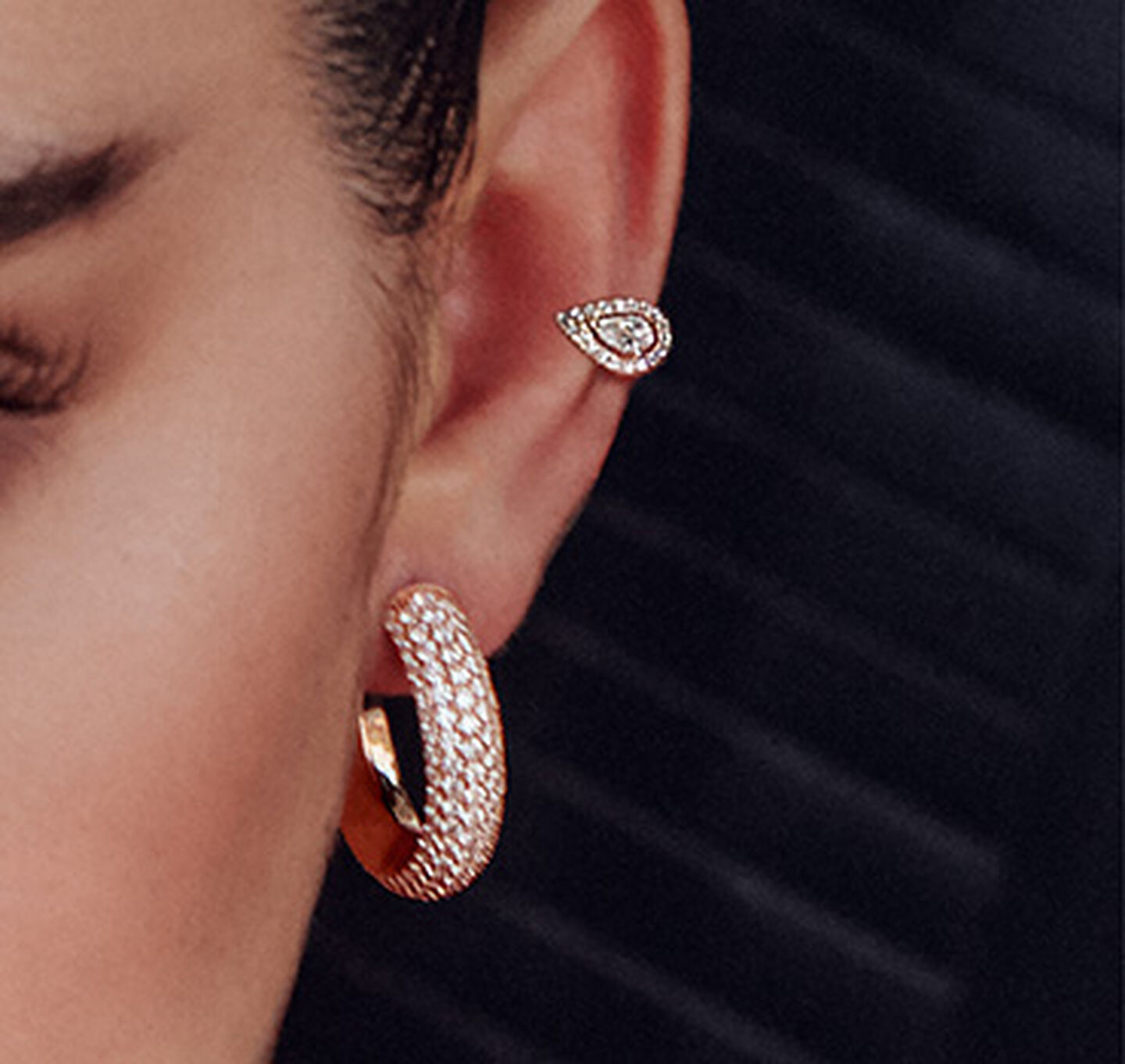 Messika earrings on ear